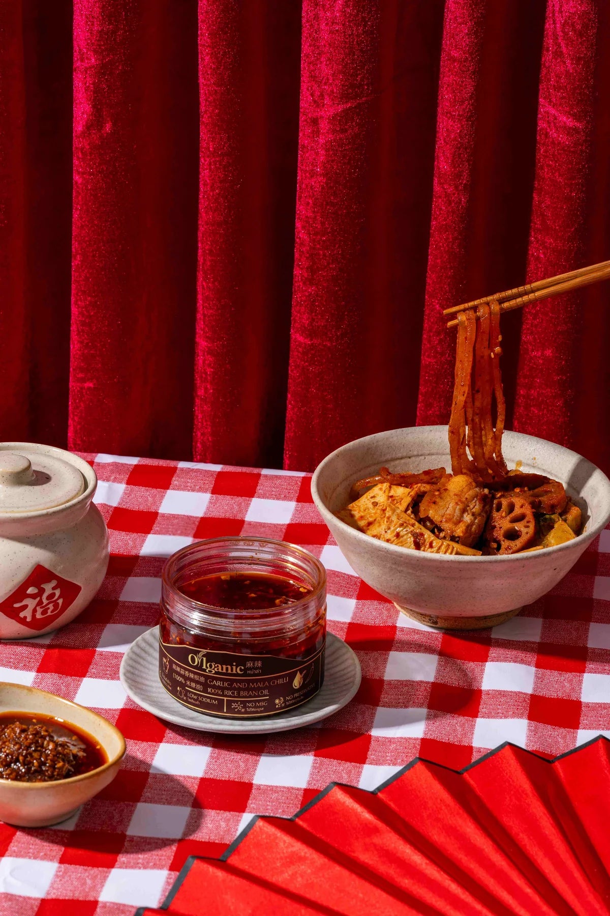 Oilganic chili paste on a Thai red table setting